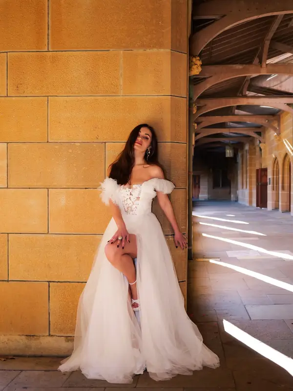 Editorial portrait under architectural arches