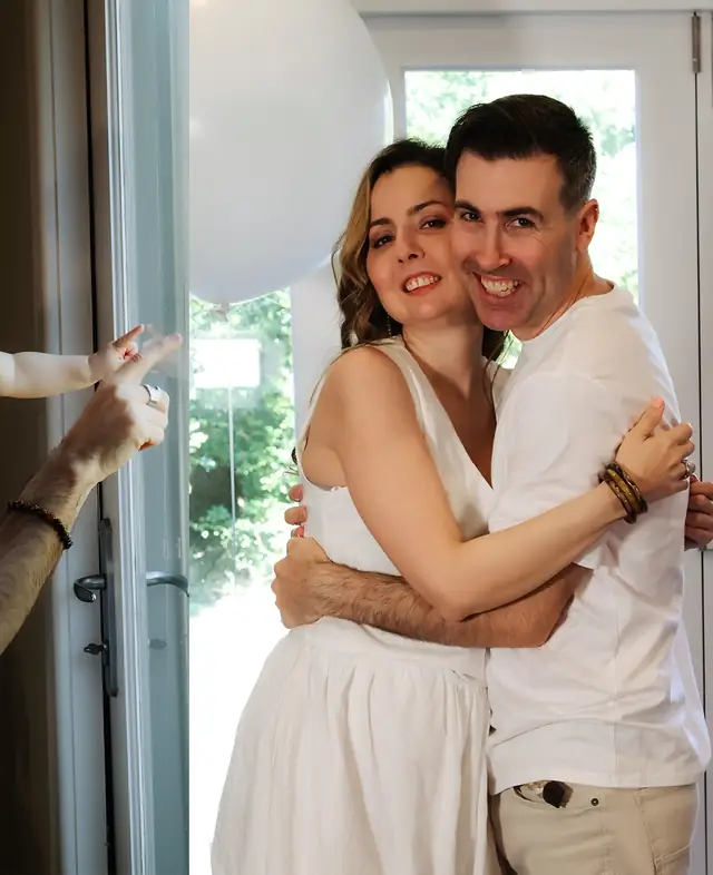A family sharing a bright candid moment
