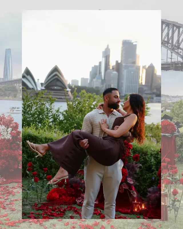 Couple celebrating beside Sydney Harbour