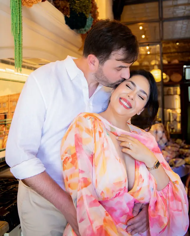 Negin and Alex sharing a candid engagement moment