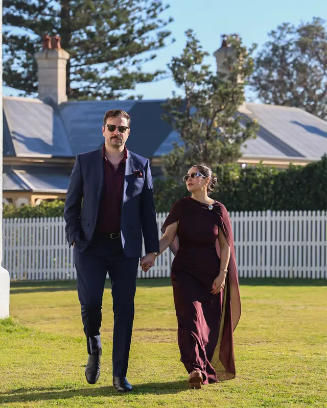 Negin and Alex walking together outdoors